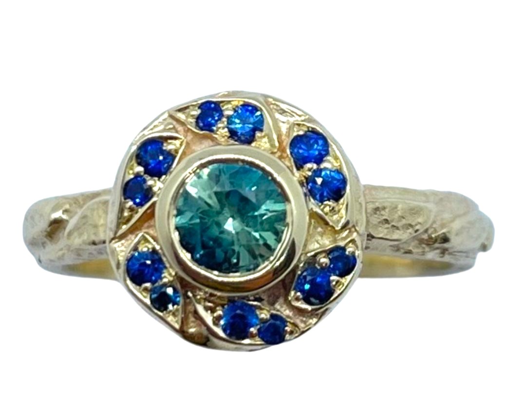 Micro Leaf Halo Sapphire Cluster Ring In Blue